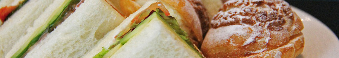 Eating Sandwich at Ellendale Cafe restaurant in Ellendale, MN.